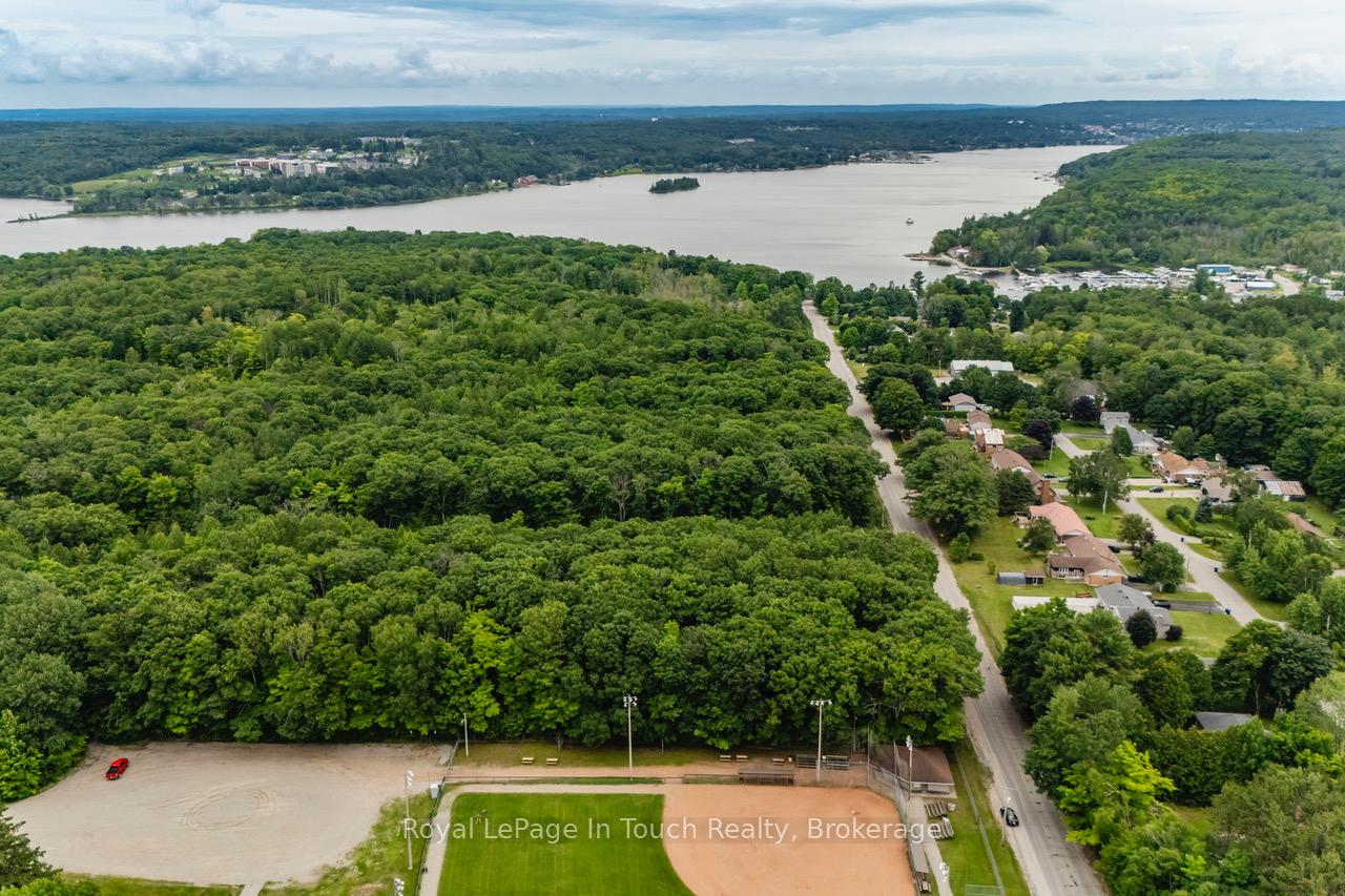 Lot 64 Whispering Pine Circle, Tiny, ON, exterior